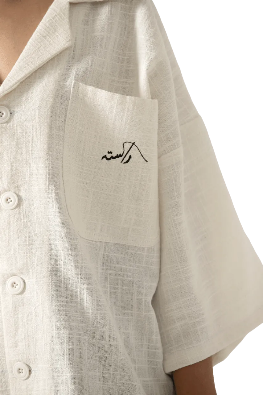beige handwoven button down